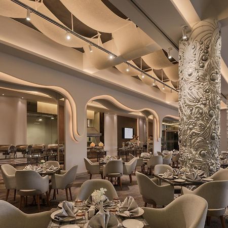 Mirage Hotel & Conference Center Alessandria Esterno foto The restaurant