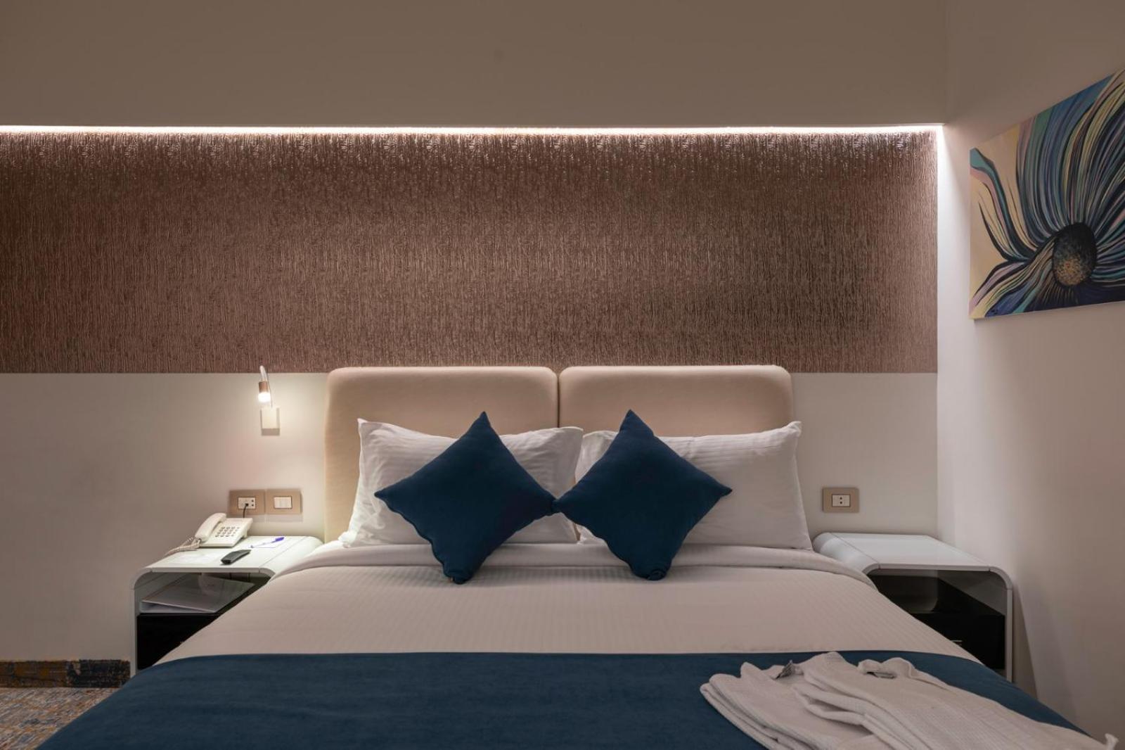 Mirage Hotel & Conference Center Alessandria Esterno foto A bedroom at the hotel